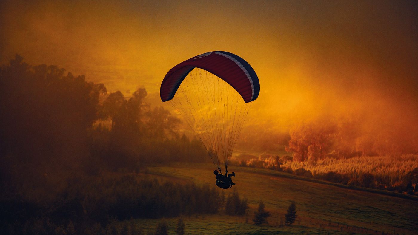 Paragliding in Veneto at sunset