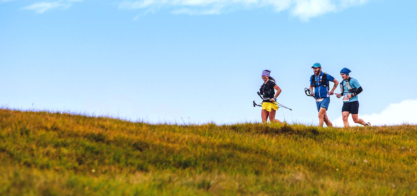 A couple walking up in the mountains